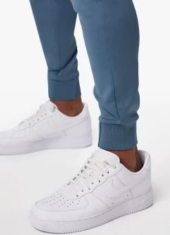 Gym King Core Plus Poly Jogger - Smoke Blue 15 Gym King Core Plus Poly Jogger - Smoke Blue -Fit Wear Shop COREPLUSPOLYFZHOOD JOGGER STONEBLUETST A2CJETSB A2CJL 370